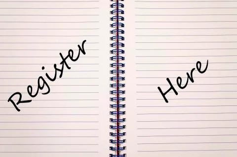 Register here write on notebook Stock Photos