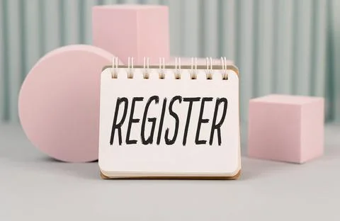 Register Text on Notebook on white table. Stock Photos