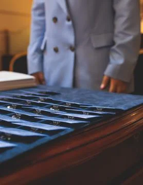 Registration desk table, process of checking in on a conference congress fo.. Stock Photos