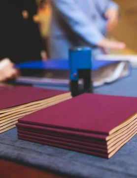 Registration desk table, process of checking in on a conference congress fo.. Stock Photos