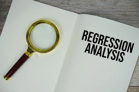 Regression Analysis text written on chalkboard with alarm clock on wooden b.. Stock Photos