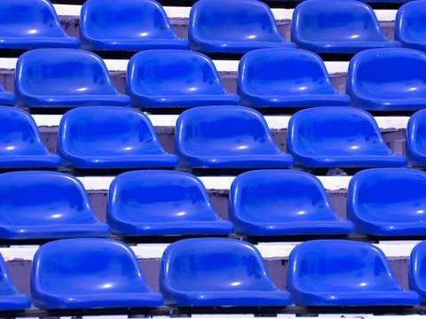 Regular blue seats in a stadium Foto stock