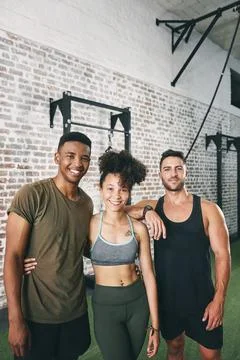 Regular exercise makes you look good and feel even better. a fitness group Foto stock