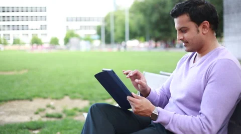 Regular guy using tablet Video stock 50217469