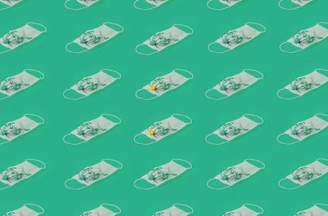 Regular Pattern Of Medical Face Masks With Flowers And Green Background. Stock Illustration