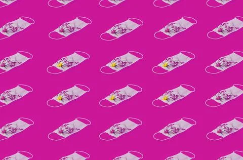 Regular Pattern Of Medical Face Masks Top View With Flowers And Pink Backgrou Stock Photos