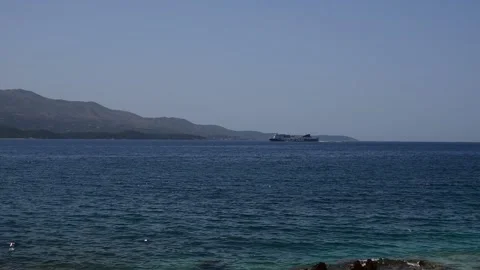 Regular sea ferry passes the strait Stock Footage 158080610