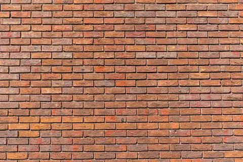 Regularly red brick wall Stock Photos