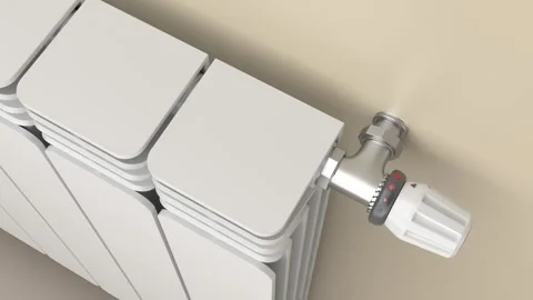Regulating the temperature of a heating radiator Stock Footage 319572550