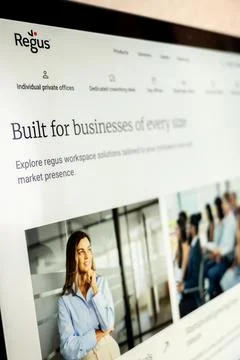 Regus website displaying workspace solutio.. Stock Photos