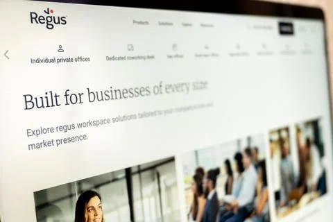 Regus website displaying workspace solutio.. Stock Photos