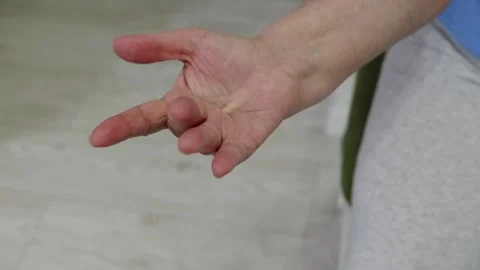 Rehabilitation session targeting hand mobility in elderly individuals Video stock 331053053