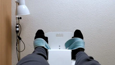 Rehabilitation Therapy Session With Ankle Exerciser On Medical Chair Stock Footage 322097424