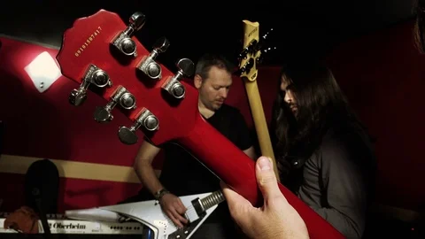 Rehearsal studio, practice room: rock band during a practice session Stock Footage 72635239