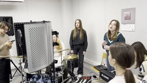 Rehearsal vocalists in the recording studio. Stock Footage 236925809