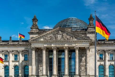 Reichstag Facade with German Flags Stock Photos