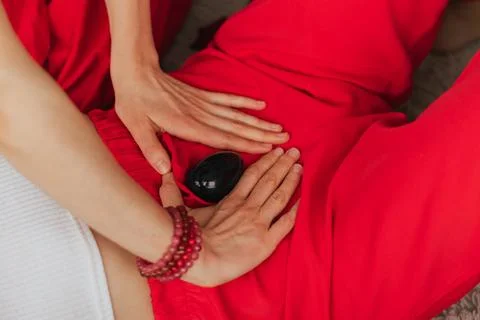 Reiki master conducts session session during days of woman who is phase of Stock Photos