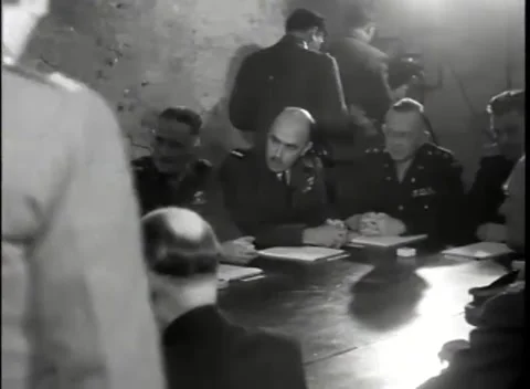 REIMS - 1945: German surrender signing - Officers seated in map room Stock Footage 343791252