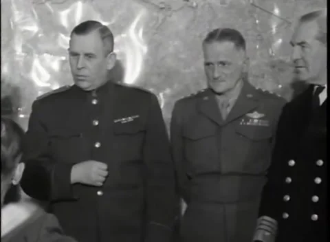 REIMS - 1945: German surrender signing - Three officers stand before map Stock Footage 343791278