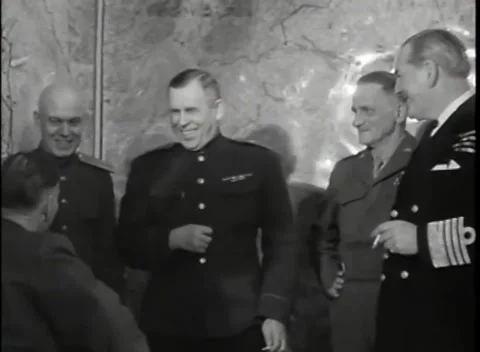 REIMS - 1945: German surrender signing - Officers laugh before map wall Stock Footage 343791279