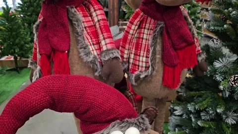 Reindeer toy in empty room decorated with Christmas tree, lights and other Stock Footage 319784403