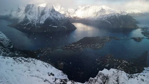 Reinebringen summit during snowfall Stock Footage 240317760