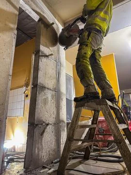 Reinforced concrete modification using diamond cutting. Stock Photos