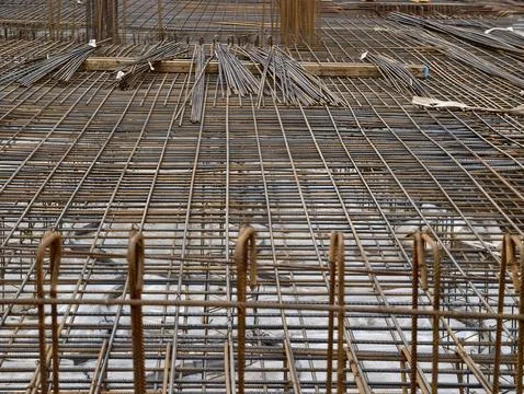 Reinforced steel pattern perspective. Low angle emphasizing symmetry and re.. Stock Photos
