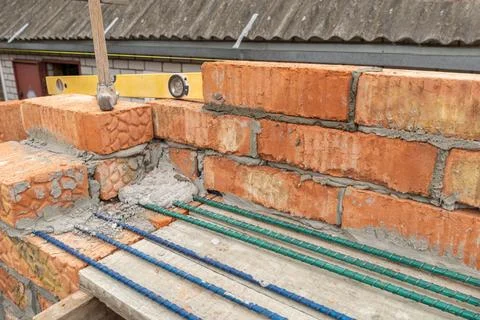 Reinforcement of masonry above windows using fiberglass reinforcement Stock Photos