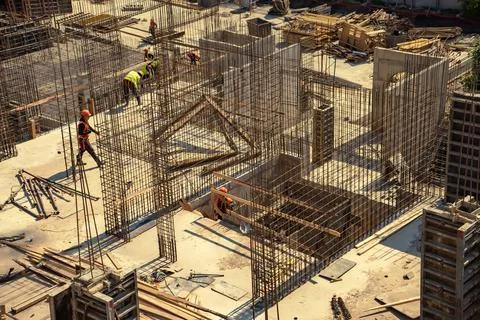Reinforcement process at a construction site in monolithic building Stock Photos