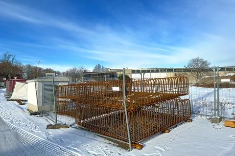 Reinforcement structures on a snow-covered construction site. Stock Photos