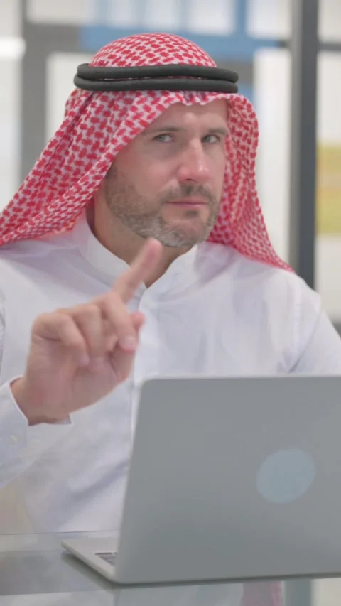 Rejecting Arab Man with Disliking Gesture at Work, vertical video Stock-Footage 324777266