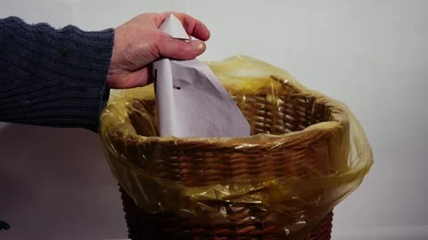 Rejecting artificial intelligence by throwing in waste bin Stock Footage 274153459