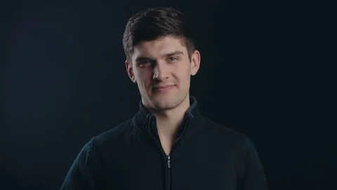 Rejecting, Young Man Gesture of No by Waving Finger. Black Background Stock Footage 71184770