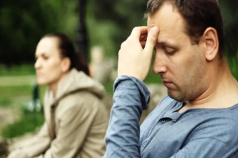 Relationship difficulties, young couple sitting on bench in the park Stock Footage 7133445