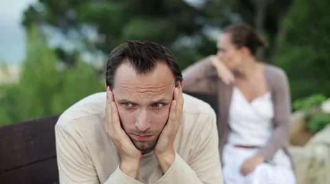 Relationship difficulties, young couple sitting outdoors HD Stock-Footage 11099131