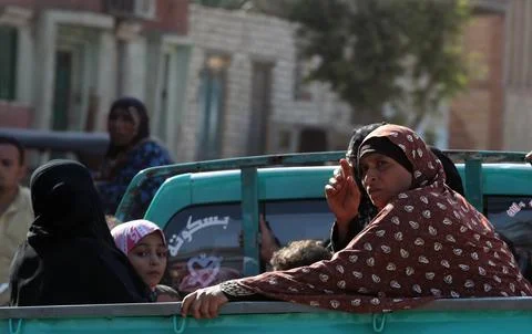 Relatives of Egyptians killed in Eastern Libya floods react after receiveing bod Stock Photos