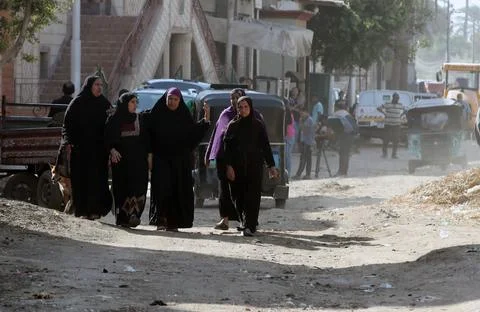 Relatives of Egyptians killed in Eastern Libya floods react after receiveing bod Stock Photos