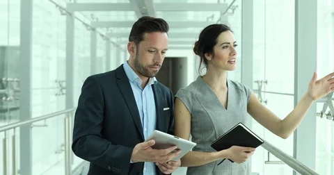 Relator showing new office space to businesswoman Video stock 74863473