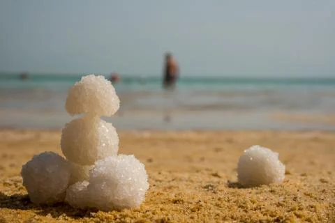 Relax balls of salt on the sand. Sky horizon. Sea. Sand. Stock Photos