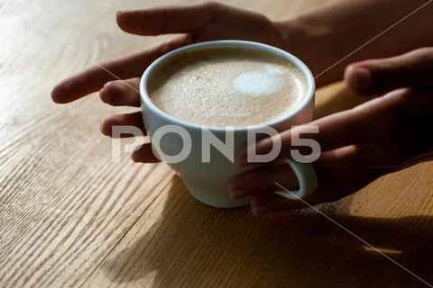 Relax in cafe or coffee shop and drinking. fresh morning coffee with milk and Stock Photos