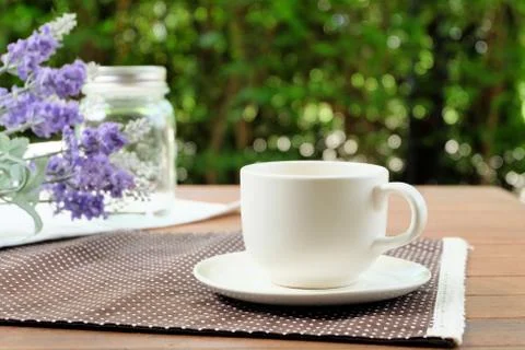 Relax with a cup of coffee at home in the garden Stock Photos