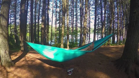 Relax into the hammock Stockbeeldmateriaal 79538624