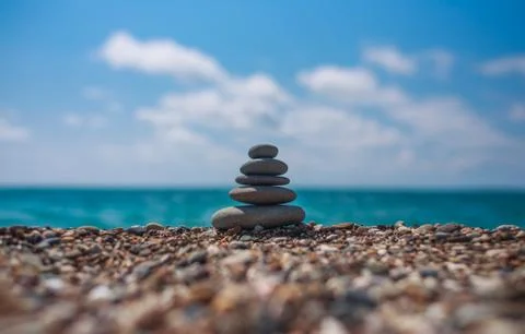 Relax image. Stack of round smooth stones on a seashore Stock-Fotos