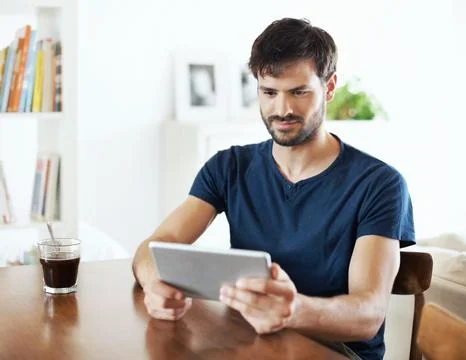 Relax, man and reading on tablet in home for morning news, social media browsing 스톡 사진