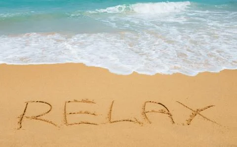 Relax message on the beach sand Fotos Stock