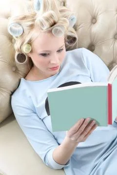 Relax with a nice book.  Stock Photos