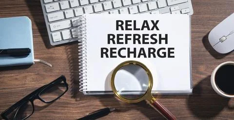 Relax, Refresh, Recharge on notepad. Stock Photos