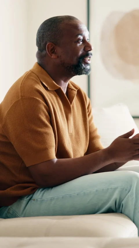 Relax, sofa and black man watching tv in home for online subscription, streaming Stock Footage 338104831