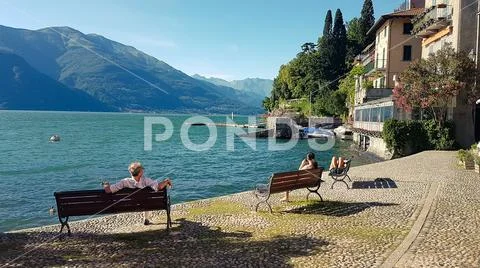 Relax in a summer day in Varenna on Lake Como, Italy. Stock Photos